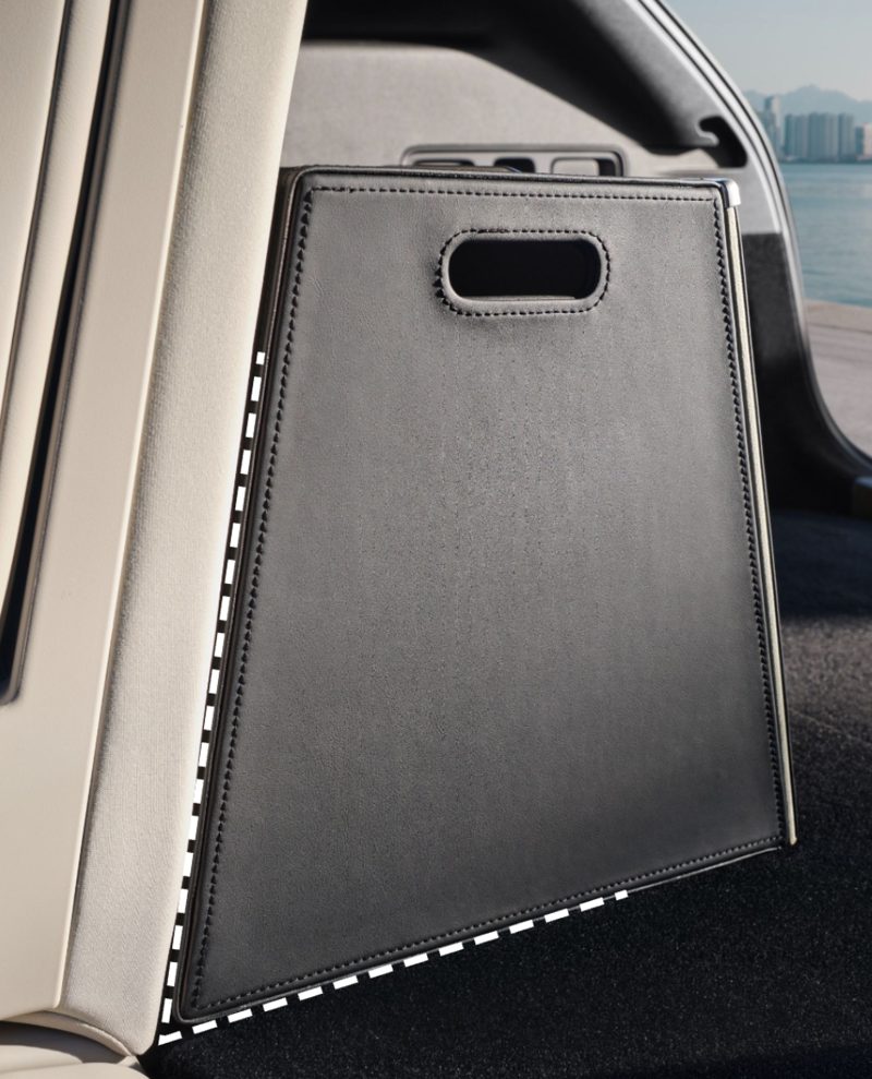 Stitched leather boot side storage panel